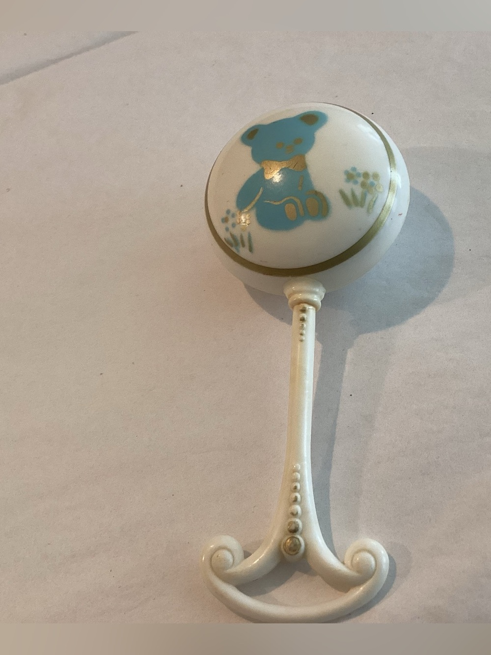 Vtg. Celluloid,hard plastic baby rattle with the other end was a teething ring